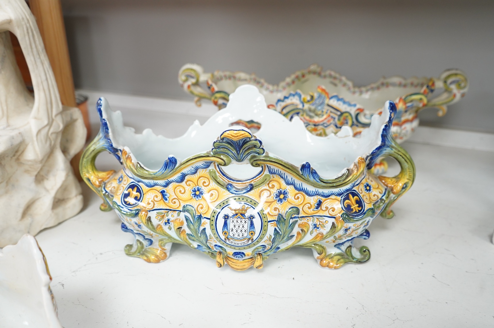 Three French faience planters, one marked Rouen, largest 50cm wide